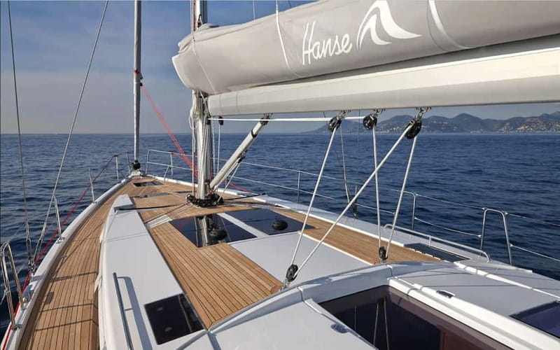 Barcelona: Luxury Sailing Experience from Port Olimpic - Taking the helm and feeling the sails