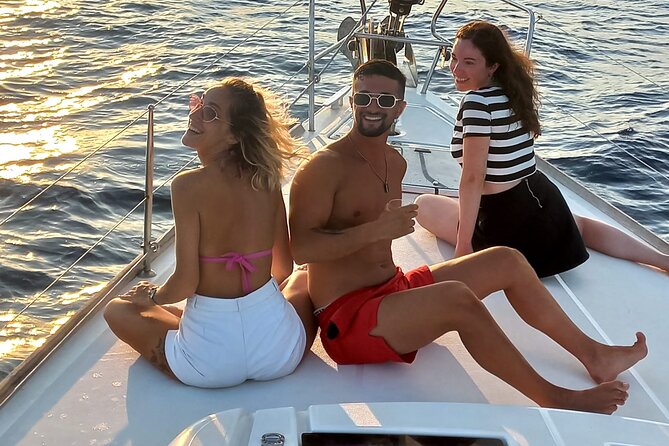Barcelona Sunset Sailing Cruise from Port Olímpic with Open Bar - Olympic Towers and the Barcelona skyline