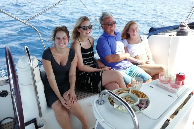 Exclusive Barcelona Private Luxury Sailing Cruise with Open Bar - Olympic Towers, fortress views, and the pontoon shopping center