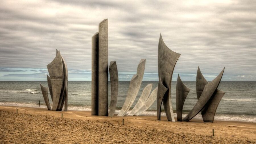 From Le Havre: D-Day Beaches Shore Trip with Packed Lunch - Pointe du Hoc shows the physical challenge of the assault