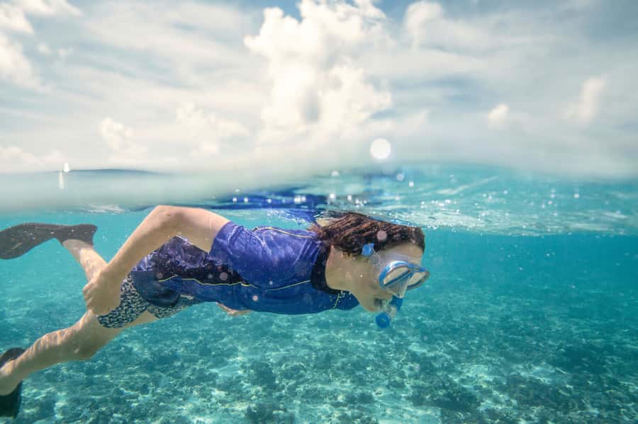 From Port Douglas: Outer Reef Cruise by Luxury Catamaran - A coral cay with time to slow down