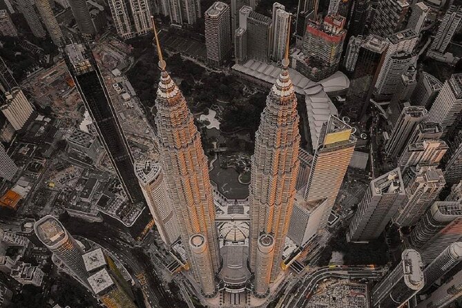 From Port Klang Petronas Twin Tower Batu Caves & KL City Tour - The Petronas Twin Towers, Kuala Lumpur’s essential view