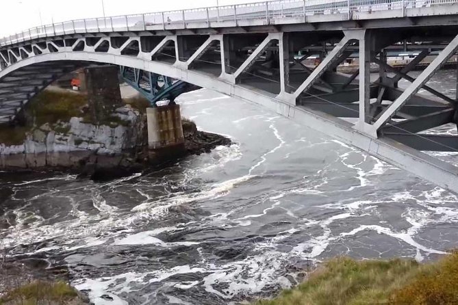 Fundy Coast to Fundy Shore Tour - St. Martins: fishing boats, bridges, and tide-shaped stone