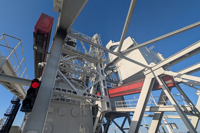 Guided Antwerp Port Tour, in your Car or Minibus - Havenhuis and the dry docks: a dramatic opening