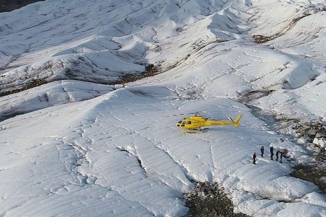 Helicopter to a Dogsledding Experience with a Glacier Landing - Weather is the main risk
