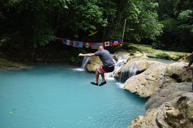 Montego Bay Shore Excursion: Blue Hole & Secret Falls Tour plus Shopping - Scotchies gives the day a Jamaican food break
