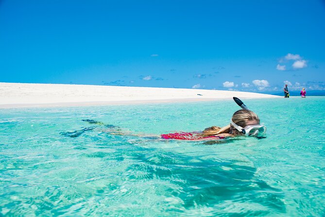 Outer Reef Mackay Cay Sail & Snorkel Adventure from Port Douglas - The glass-bottom boat and coral cay stop