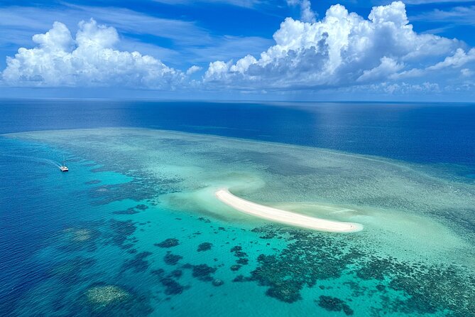 Outer Reef Mackay Cay Sail & Snorkel Adventure from Port Douglas - Snorkeling help for confident and cautious swimmers