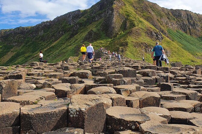 Shore Excursion from Belfast to Giants Causeway & Rope Bridge - Cushendun Caves and the village waterfront