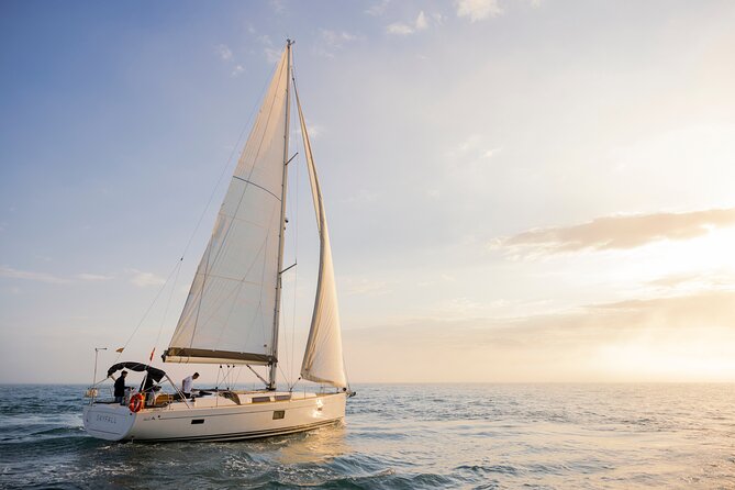 Sunset On A Luxury Sailboat From Port Olimpic - A relaxed evening with Captain Cristian