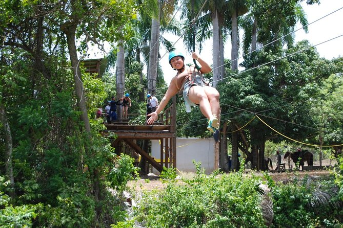 VIP DayPass: ATV, ZipLine, Horse Riding / Shore Excursion & Hotel - ATV riding through villages and a riverbed